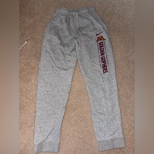 Brand: Nike 
Size: XL (I think in youth because they are small)
Color: Grey